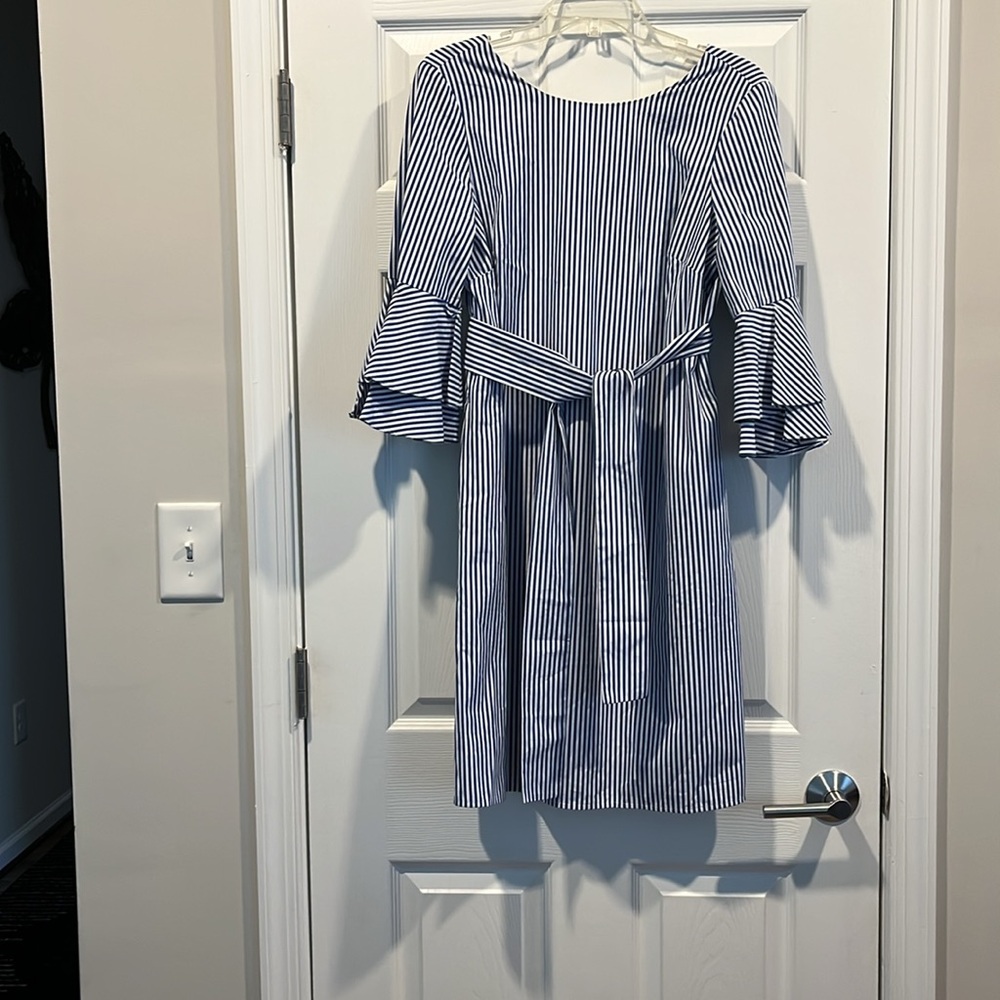 Dress blue and white pinstripes size 8. With matching beltâ two side pockets.
